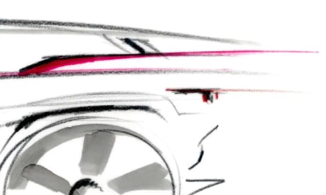 A partial drawing of what will be a modern, sleek vehicle leaps from the page, half of a wheel with 3 wide spokes visible, drawn in gray, white, and black, sitting below the start of a sweeping trunk lid, emphasized with a red contouring line and a hint of a rear window.